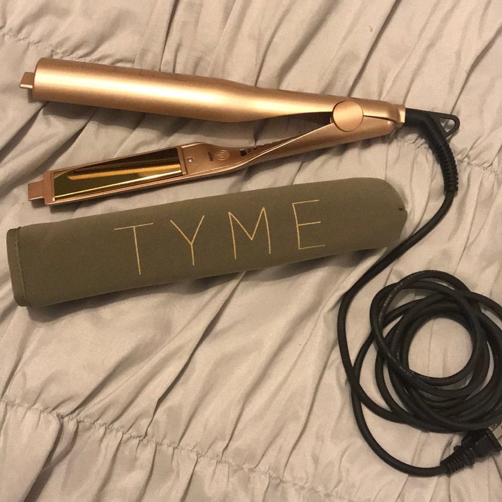 Tyme flat iron that straightens& curls!